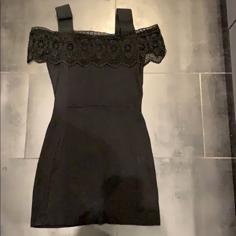 Black mini dress with good zip back and lace frill